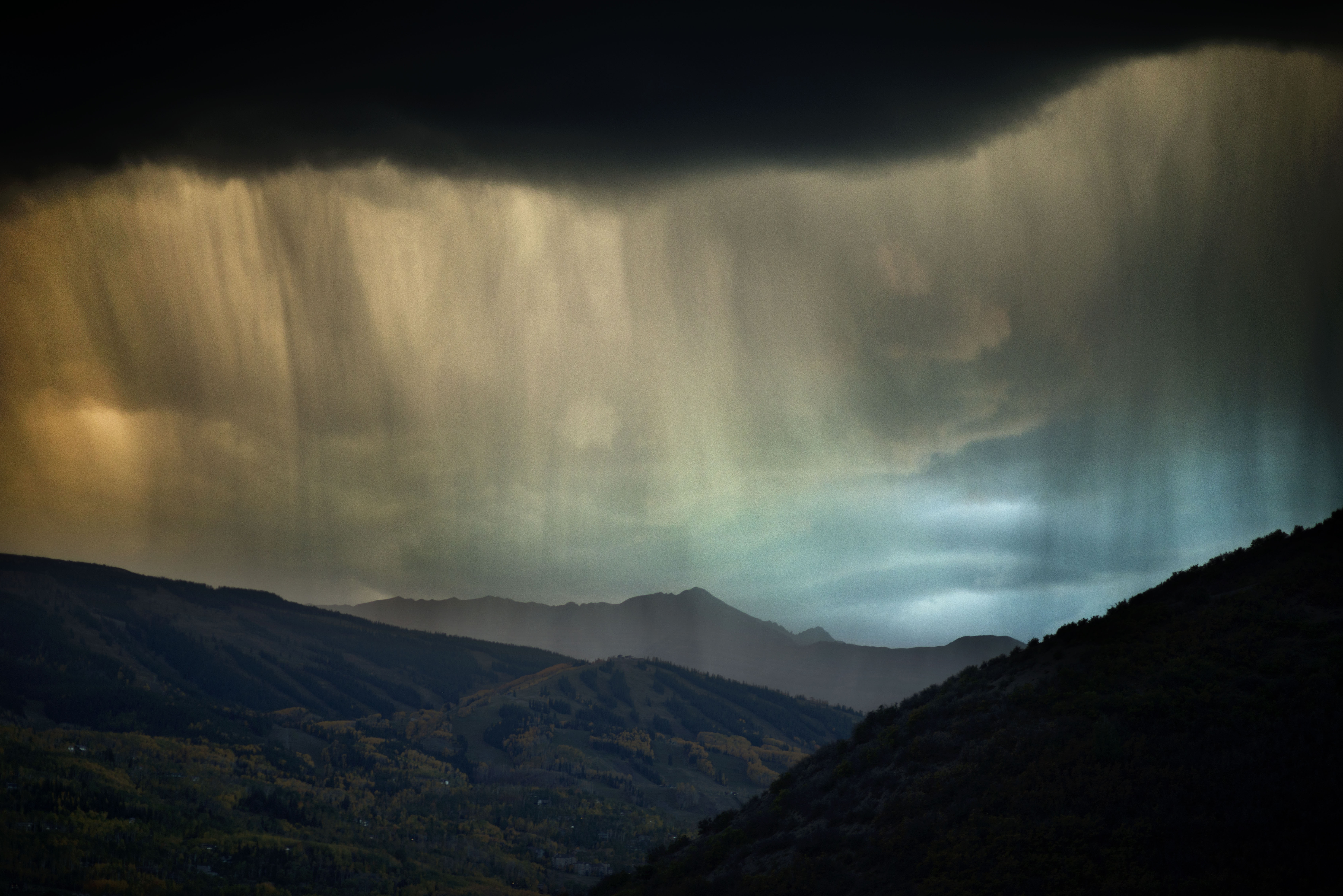 Rain showers partially obscuring a landscape, fine art nature photograph